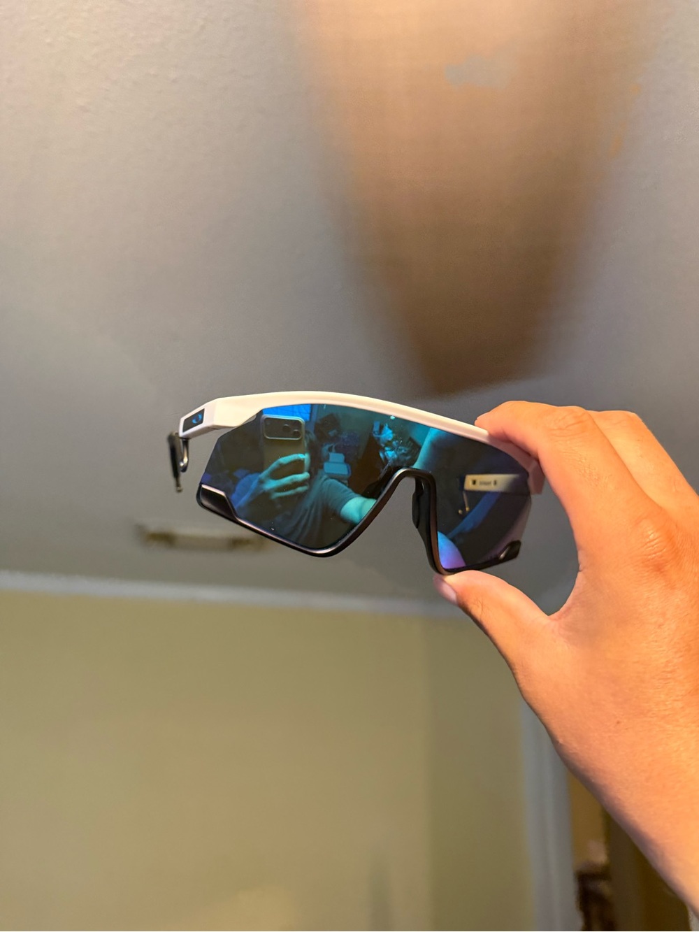 Oakley White Frame Sunglasses with Blue Mirrored Lens